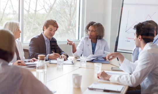 A group of doctors in a meeting